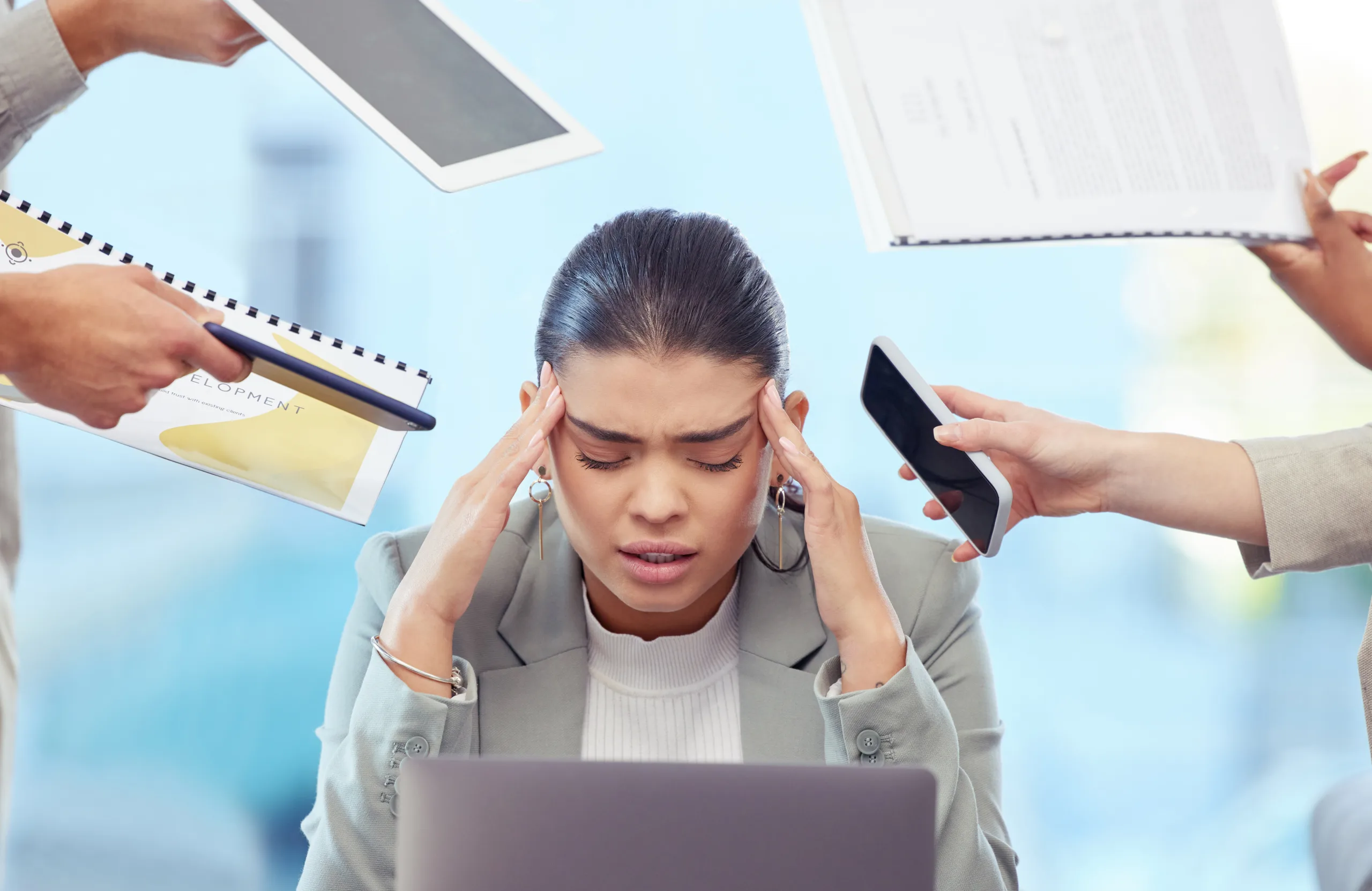 Always set healthy boundaries. Shot of a young woman having a stressful day at work